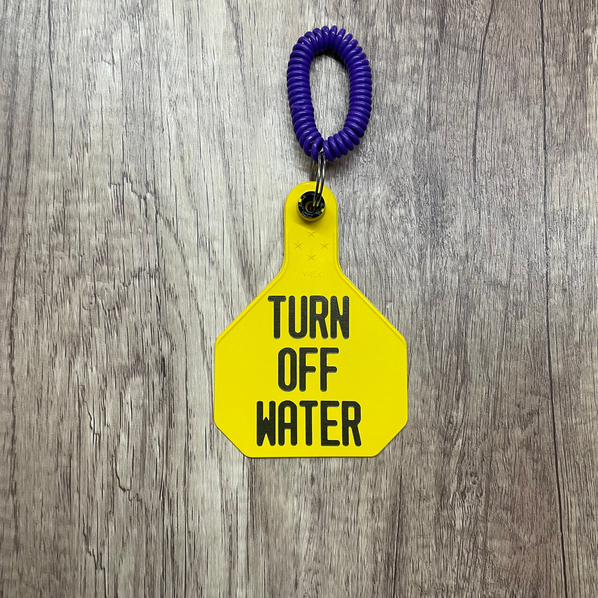 TURN OFF WATER YELLOW - YTEX 4* TAG ON KEYCHAIN